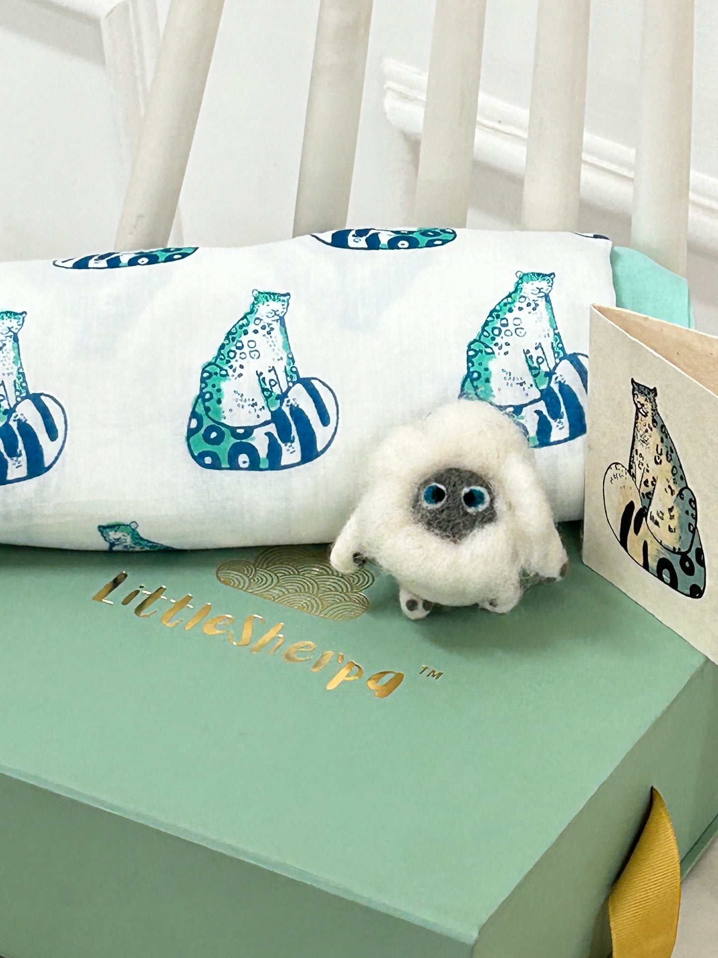 Snow Leopard dohar blanket with gift box and card.